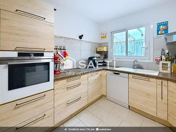 Une maison familiale cosy avec jardin et véranda, idéale pour se sentir bien chez soi !