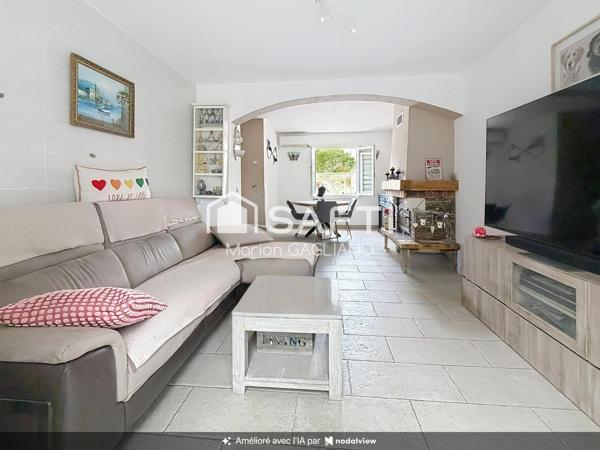 Une maison familiale cosy avec jardin et véranda, idéale pour se sentir bien chez soi !