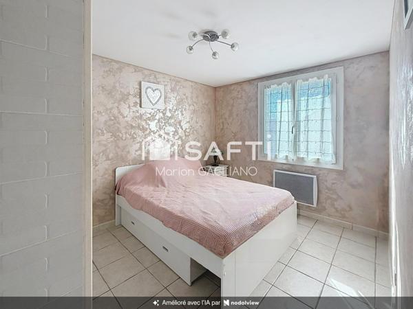 Une maison familiale cosy avec jardin et véranda, idéale pour se sentir bien chez soi !