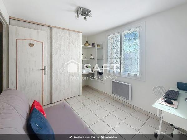 Une maison familiale cosy avec jardin et véranda, idéale pour se sentir bien chez soi !