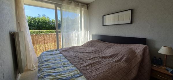 Appartement lumineux et fonctionnel en rez-de-chaussée