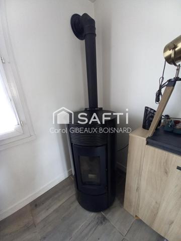 Maison rénovée sur sous-sol avec 3 chambres, garage et terrain