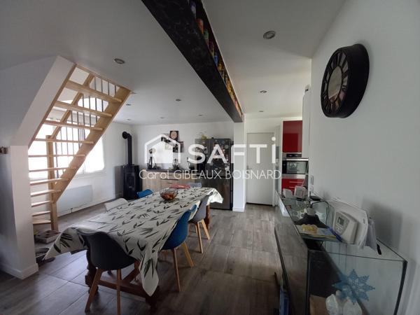 Maison rénovée sur sous-sol avec 3 chambres, garage et terrain