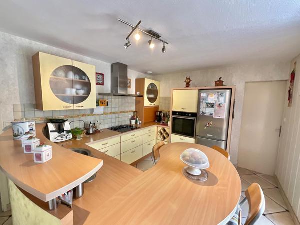 Maison de plain-pied 121m2, véranda, garage sur une parcelle de 685m2