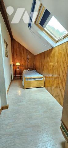 Maison de ville avec garage et terrain