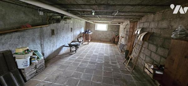 Maison de ville avec garage et terrain