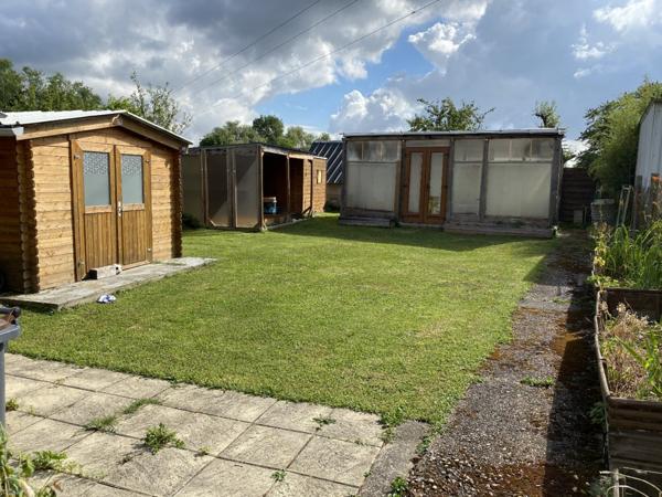 Jolie maison mitoyenne atypique