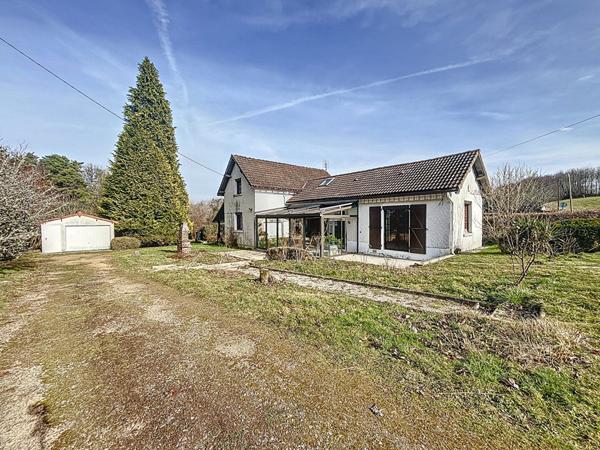 Maison a vendre Favars - 3 chambres - garage - vie de plain pied - jardin et bois