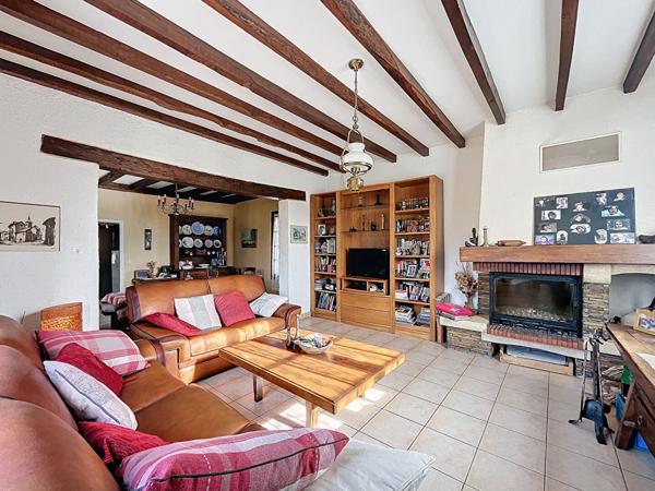 Maison a vendre Favars - 3 chambres - garage - vie de plain pied - jardin et bois