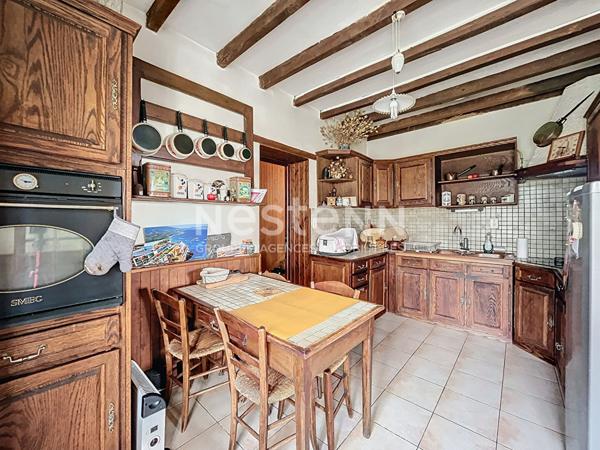 Maison a vendre Favars - 3 chambres - garage - vie de plain pied - jardin et bois