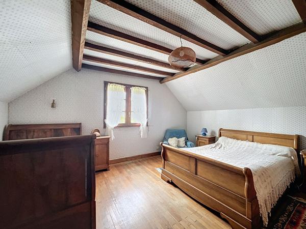 Maison a vendre Favars - 3 chambres - garage - vie de plain pied - jardin et bois