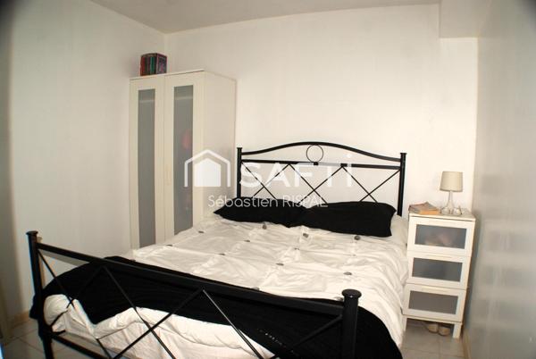 Maison en pierre de plain pied 3 chambres, garage terrain