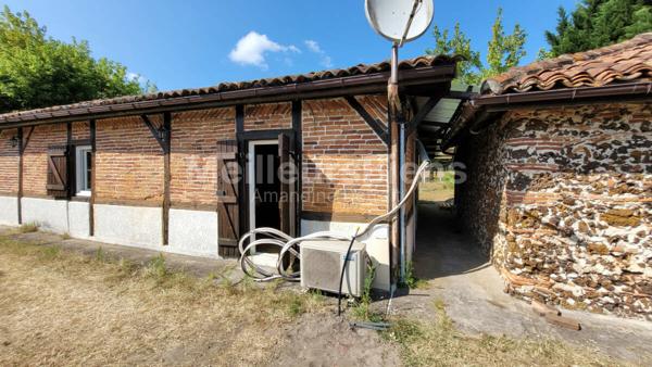 Maison T2 27m², terrain 120 m², en centre ville