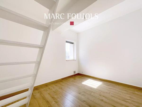 Appartement en centre-ville avec garage 8 véhicules