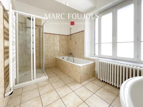 Appartement en centre-ville avec garage 8 véhicules