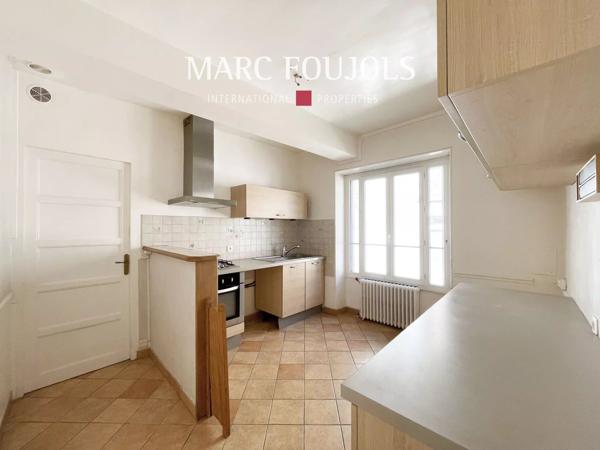 Appartement en centre-ville avec garage 8 véhicules
