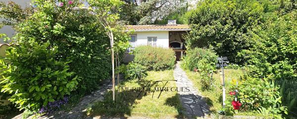 Maison T6 à Castelnaudary de 120m2, 4 CH, jardin, garage, DPE en D, proche commerce