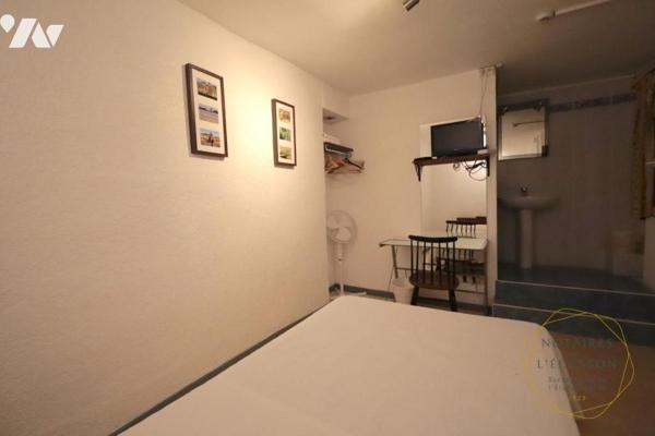 Hôtel à Vendre avec 15 chambres, 2 appartements et un local commercial