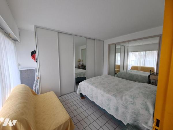 APPARTEMENT T2 au 1er étage avec ascenseur, 1 balcon, 1 cellier, 1 place de parking privatif