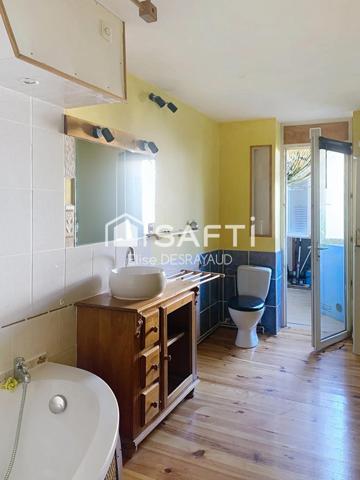 Grand appartement lumineux au centre ville tout en étant au clame