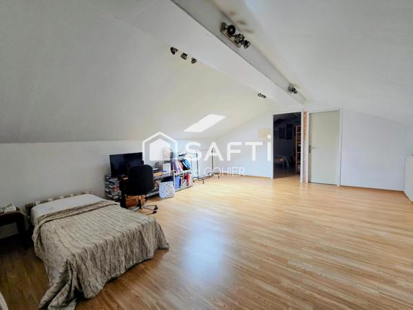 IMMEUBLE DE RAPPORT–COMMERCE, HABITATION, GARAGES