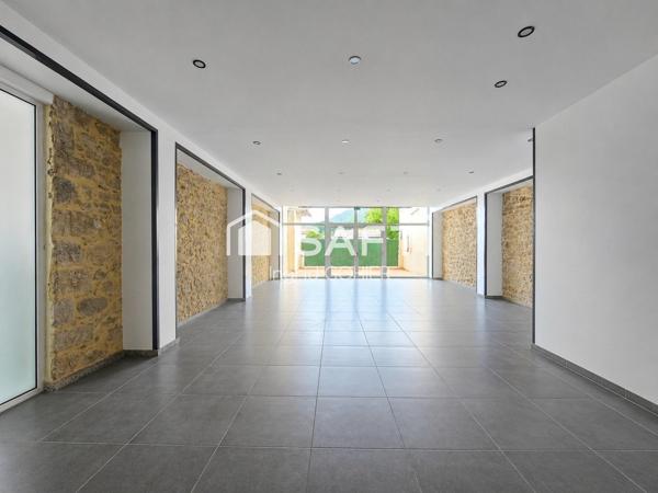 IMMEUBLE DE RAPPORT–COMMERCE, HABITATION, GARAGES