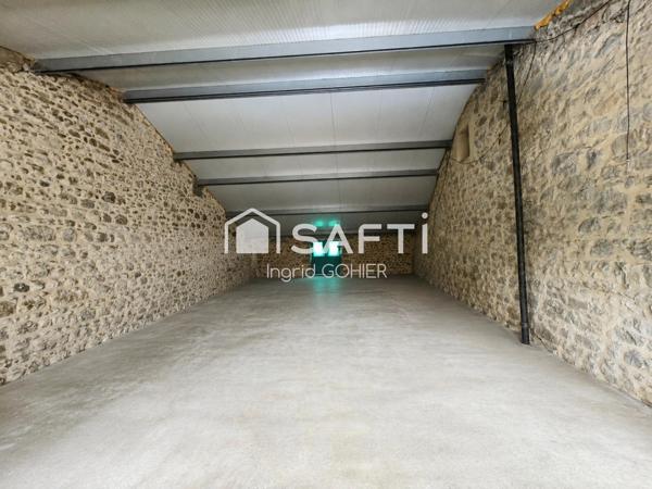 IMMEUBLE DE RAPPORT–COMMERCE, HABITATION, GARAGES