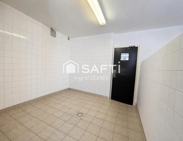 IMMEUBLE DE RAPPORT–COMMERCE, HABITATION, GARAGES