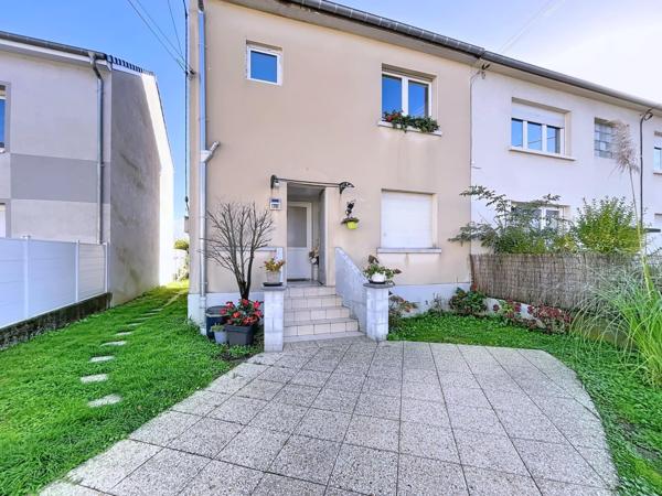 Duplex avec jardin et garage