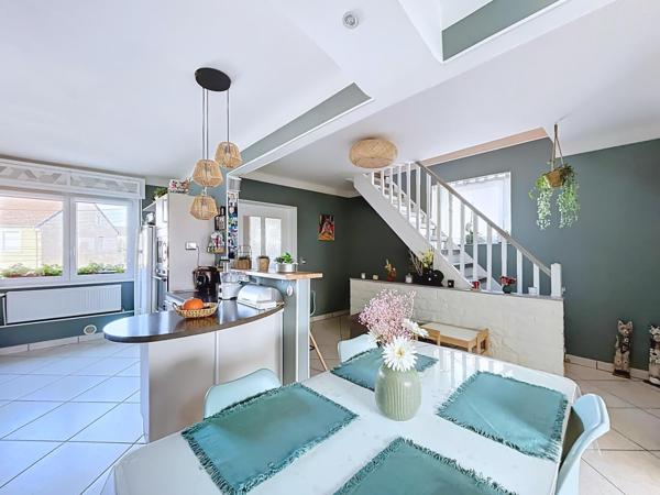 Duplex avec jardin et garage