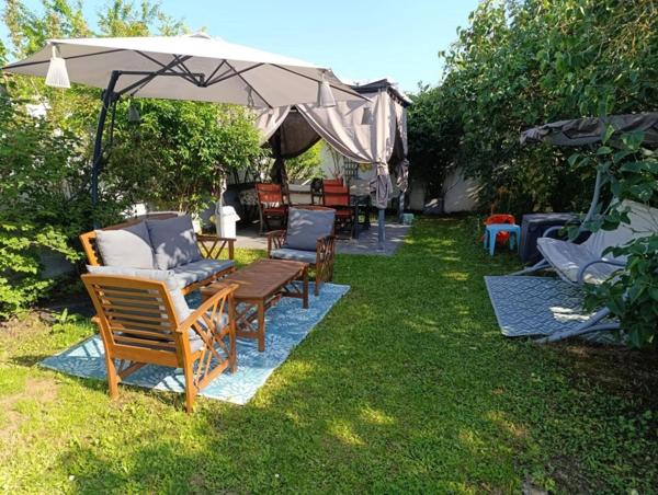 Duplex avec jardin et garage