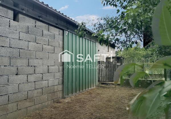 Maison de plain pied avec hangar