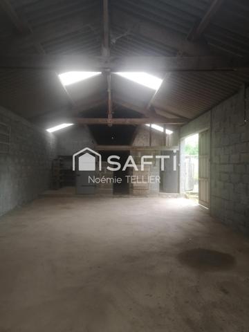 Maison de plain pied avec hangar