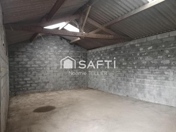 Maison de plain pied avec hangar