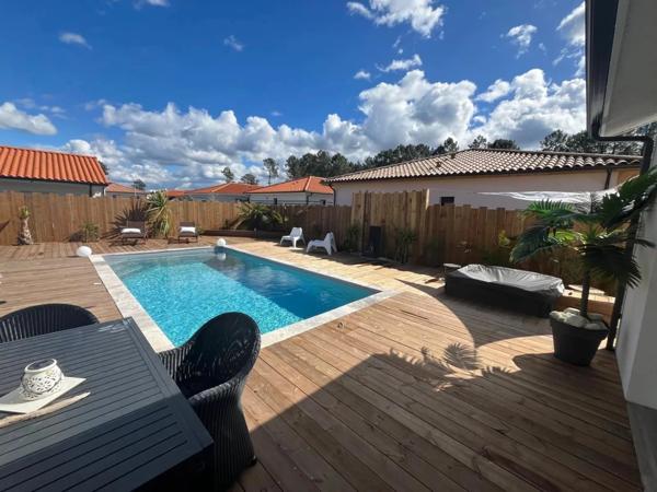 Mimizan Raffinement et Confort : Villa avec Piscine au Calme