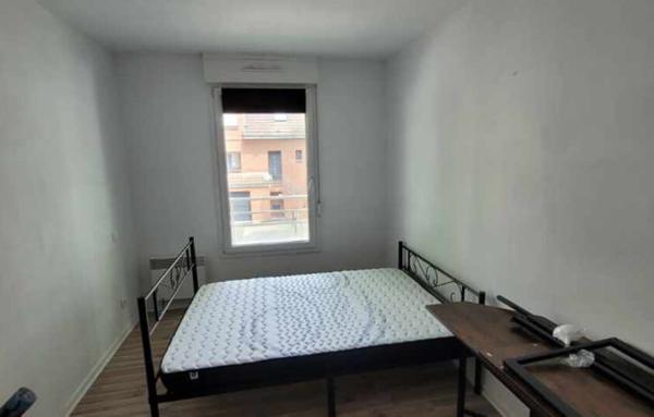 APPARTEMENT 2 CHAMBRES , BALCON , GARAGE