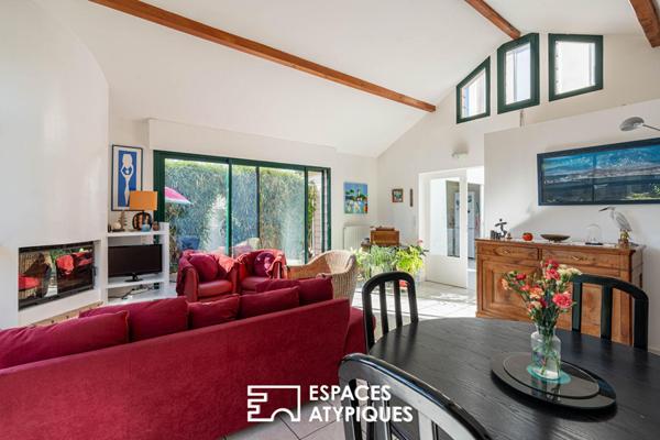 Basse-Indre : Charmante maison des années 30 au séjour cathédrale et joli jardin