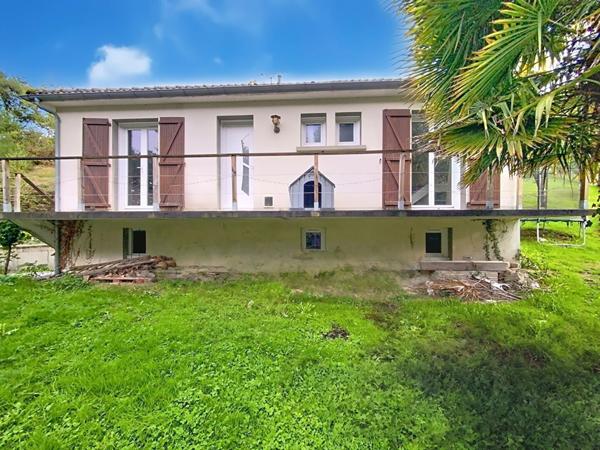 Maison de 101 m² - 3 chambres dont une suite parentale - garage - terrain arboré de 2700 m²