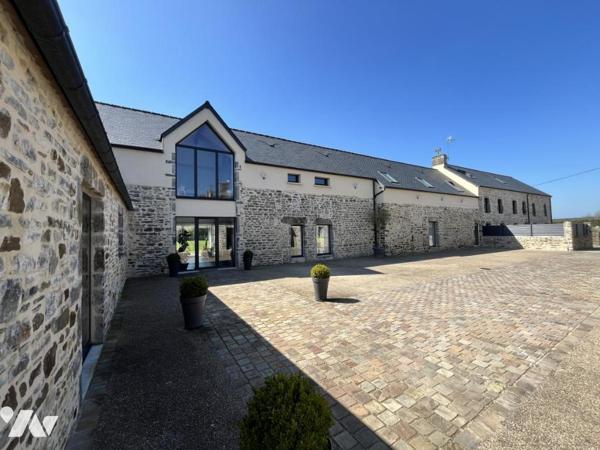 Ancien corps de ferme entièrement réhabilité en 4 maisons de standing