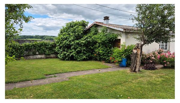 Deyvillers - Maison mitoyenne d'un coté - 192 m2 - garages, terrasse et terrain
