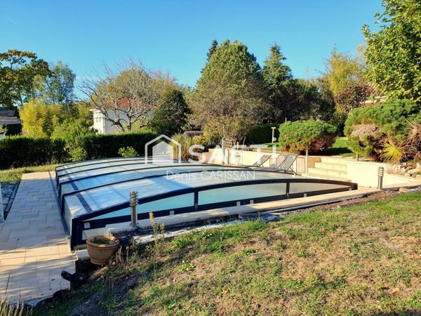 Maison 7 pièces plain-pied + piscine + garage + carport