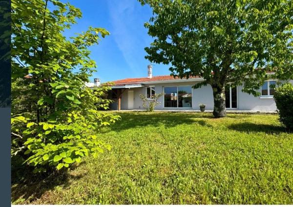 Maison avec trois chambres