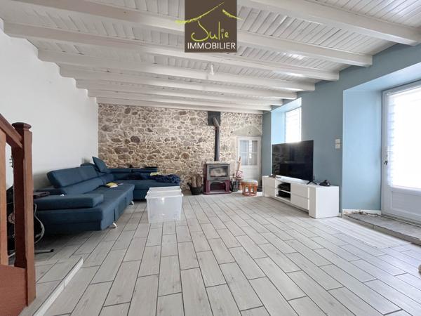 Bon placement locatif ! Maison restaurée avec garage, cour et jardin. Bail en cours : Idéal investisseur!!