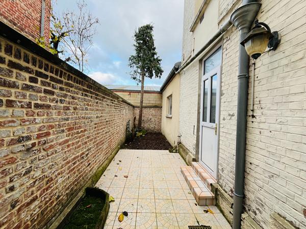 A LOUER APPARTEMENT EN RDC  PROCHE CENTRE VILLE DE ST QUENTIN 02100