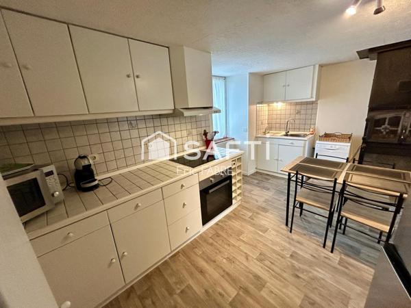 Maison 2 chambres salon cuisine terrasse cave