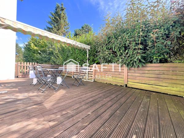 Maison mitoyenne de 125 m2 moderne avec jardin, garage et place de parking