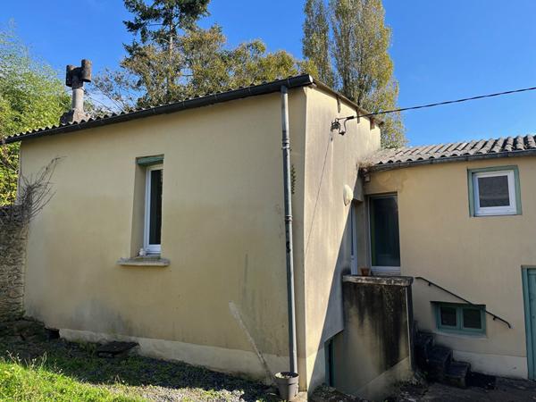 Maison de ville avec terrain + studio loué