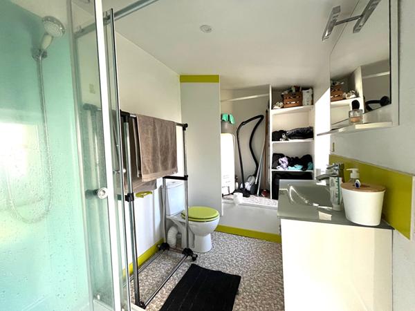 Maison de ville avec terrain + studio loué