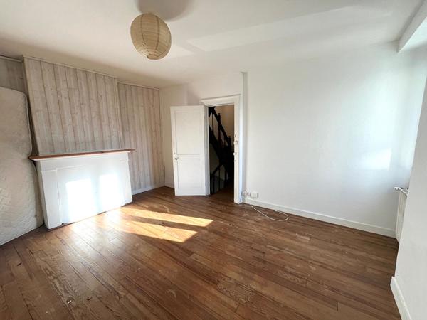 Maison de ville avec terrain + studio loué