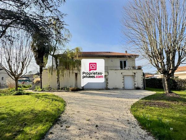 Maison T4 /5 d'env. 136 m²  avec 3/4 ch . et  garage double proche centre ville de SAINT-ASTIER (24100)